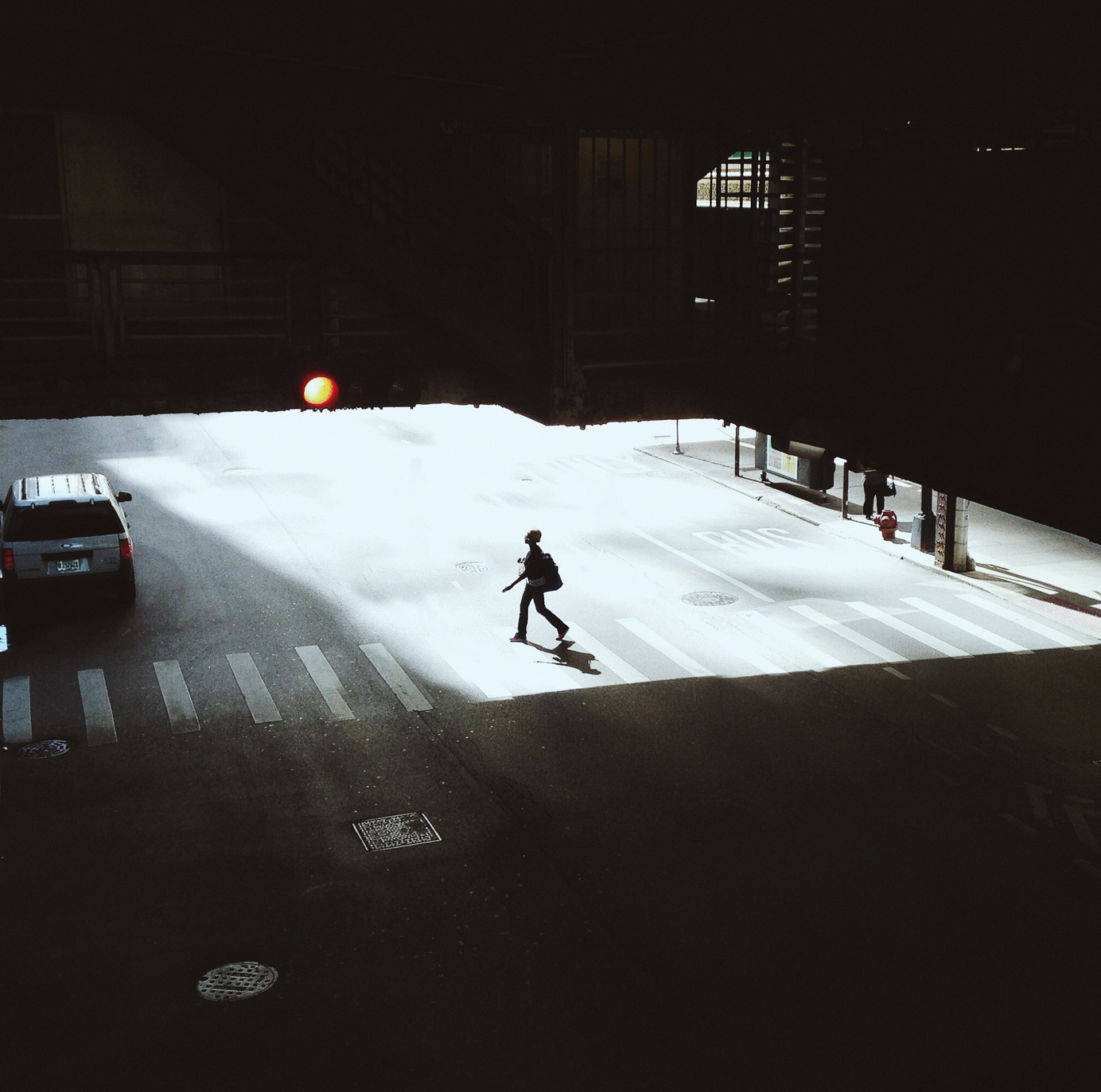 High Angle View Of Silhouette Woman Crossing Road