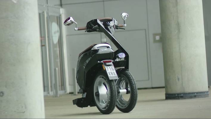 Futuristic Folding Electric Scooter