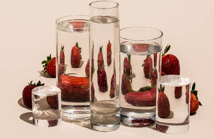 Distorted Fruit and Vegetables Through Water-Filled Glasses