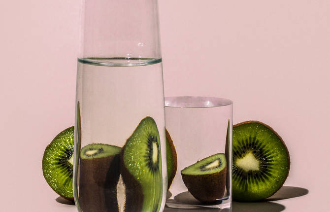 Distorted Fruit and Vegetables Through Water-Filled Glasses