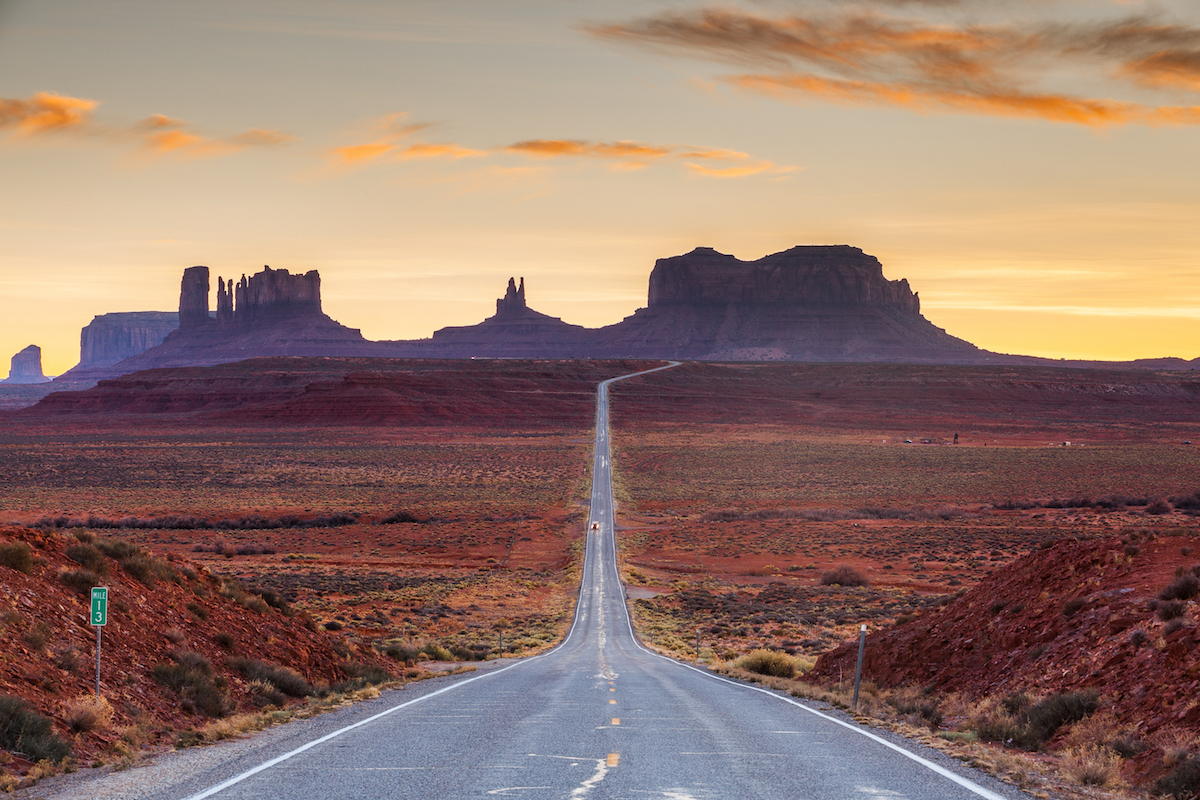 Road across Monument Valley, Navajo, Utah, USA
