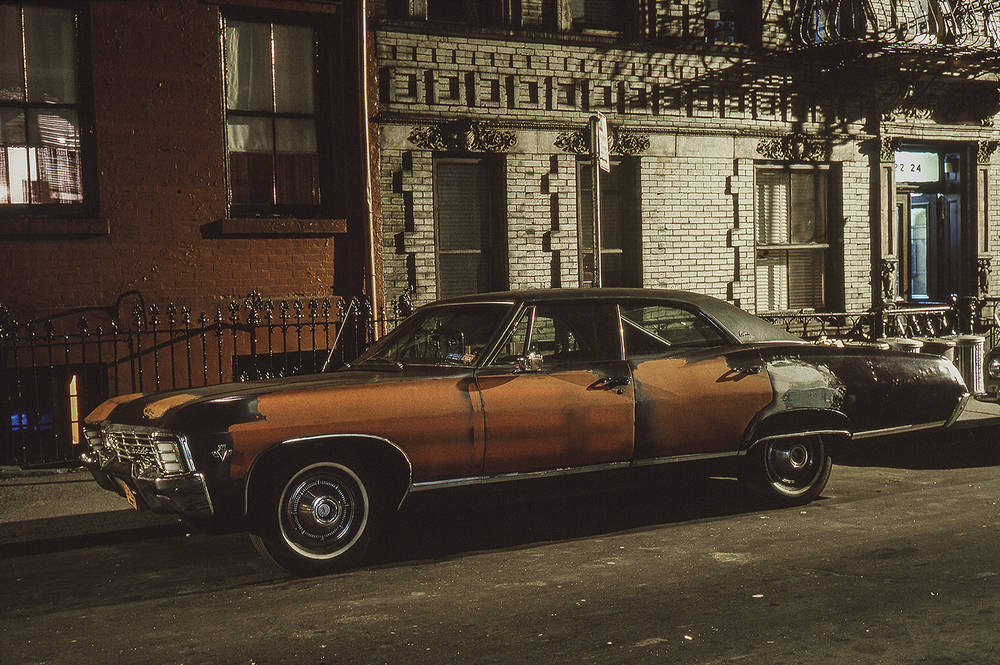Parked Cars Under Streetlamps in 1970s New York City Media