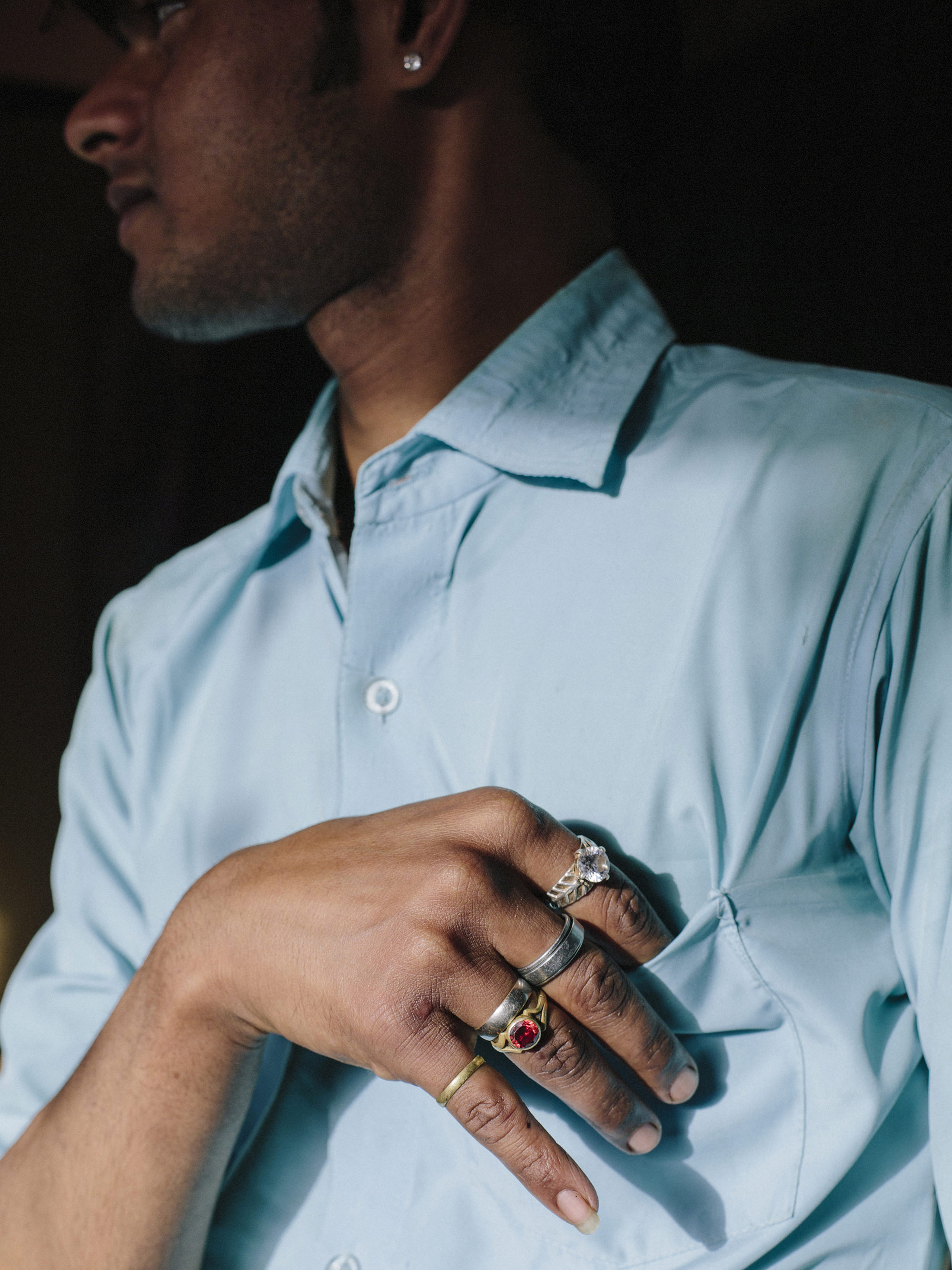 Young indian man with rings. Agra, Uttar Pradesh. 2017.