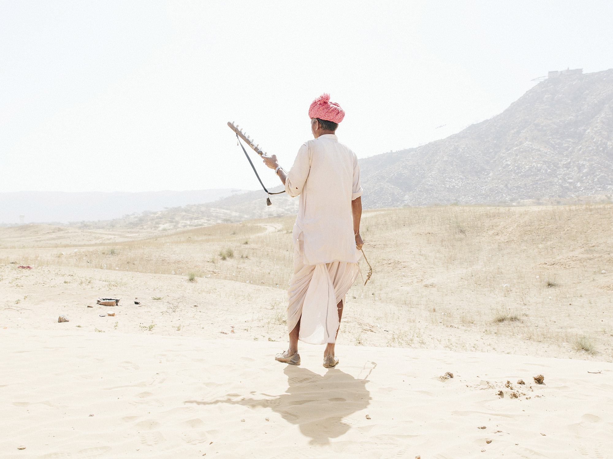 Rajasthani with Ravanahatha (ancestor of the violin). Pushkar, India. 2017.