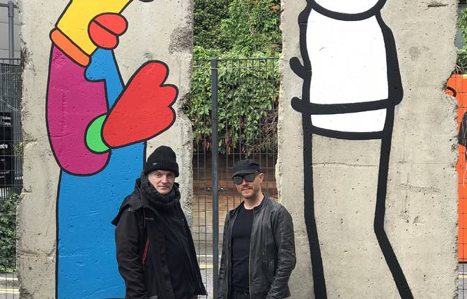 Street Artists Paint on Berlin Wall for the Anniversary of its Fall