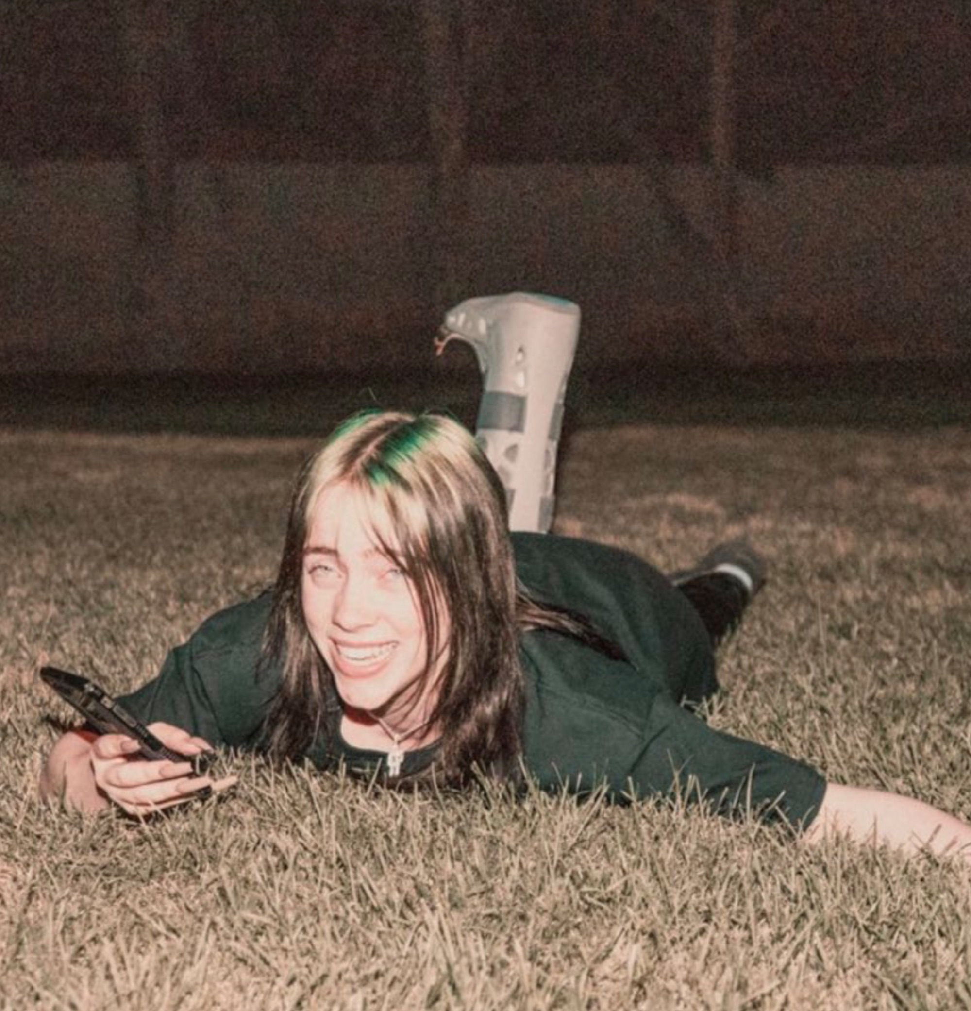 Billie-Eilish-Photo-Book-Billie-Laughing-on-the-Ground-